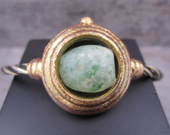 Expandable rope bracelet with jade like stone