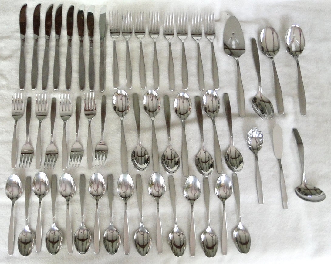 55 pcs of Rogers Cutlery Co StainlessISCREATION Pattern Flatware Set