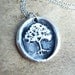 Wax seal necklace tree with hidden heart made from recycled fine silver