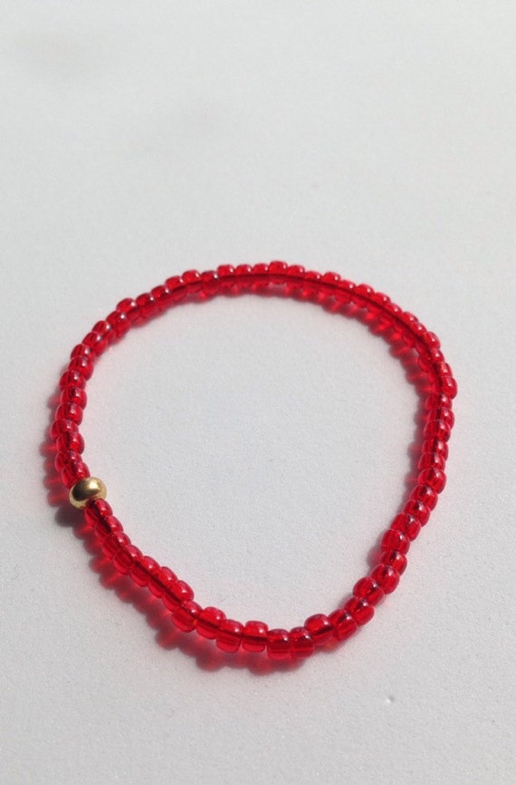 Items similar to Transparent Red Seed Bead Bracelet on Etsy