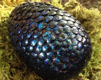 Black dragon egg with blue glitter