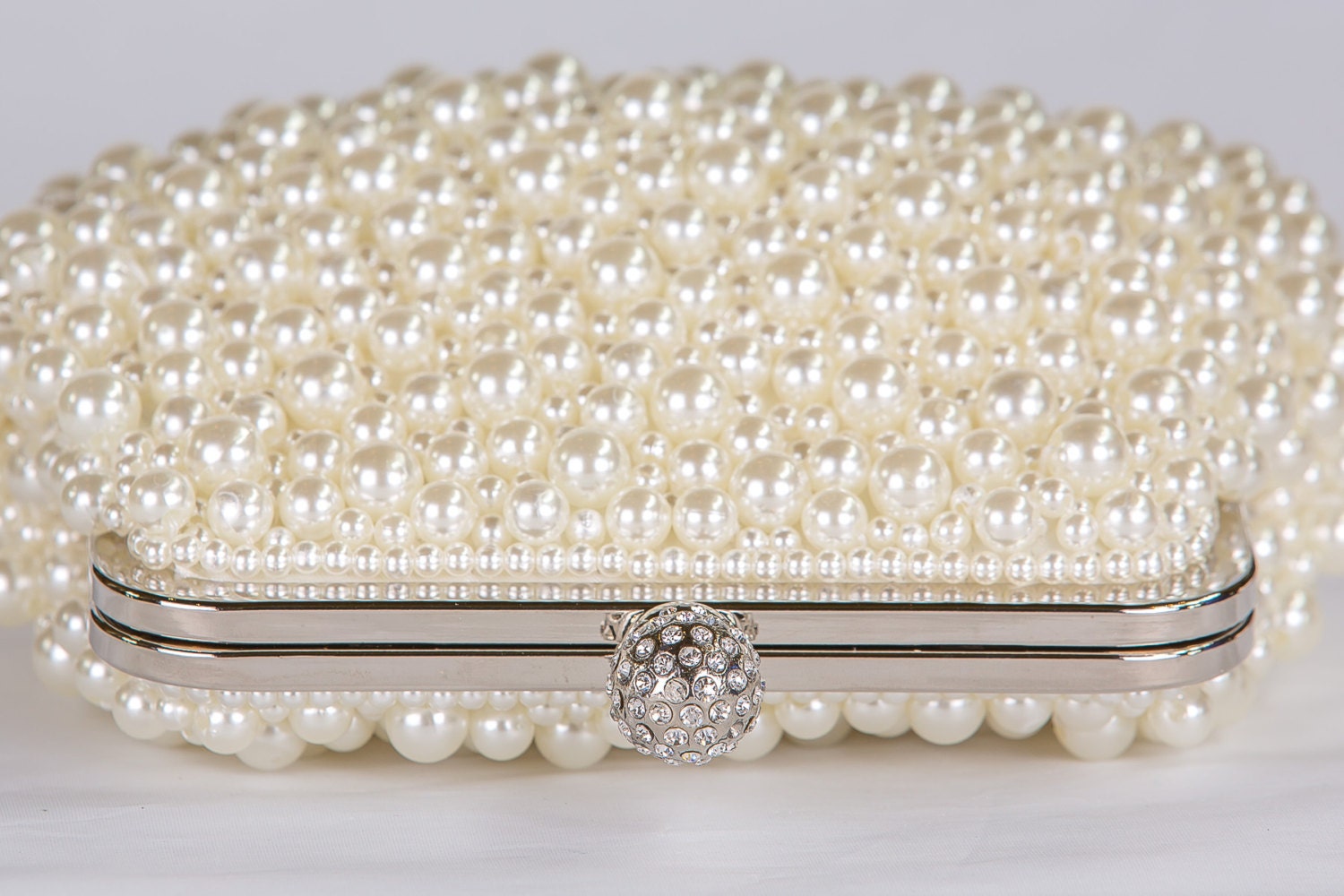 dune pearl clutch