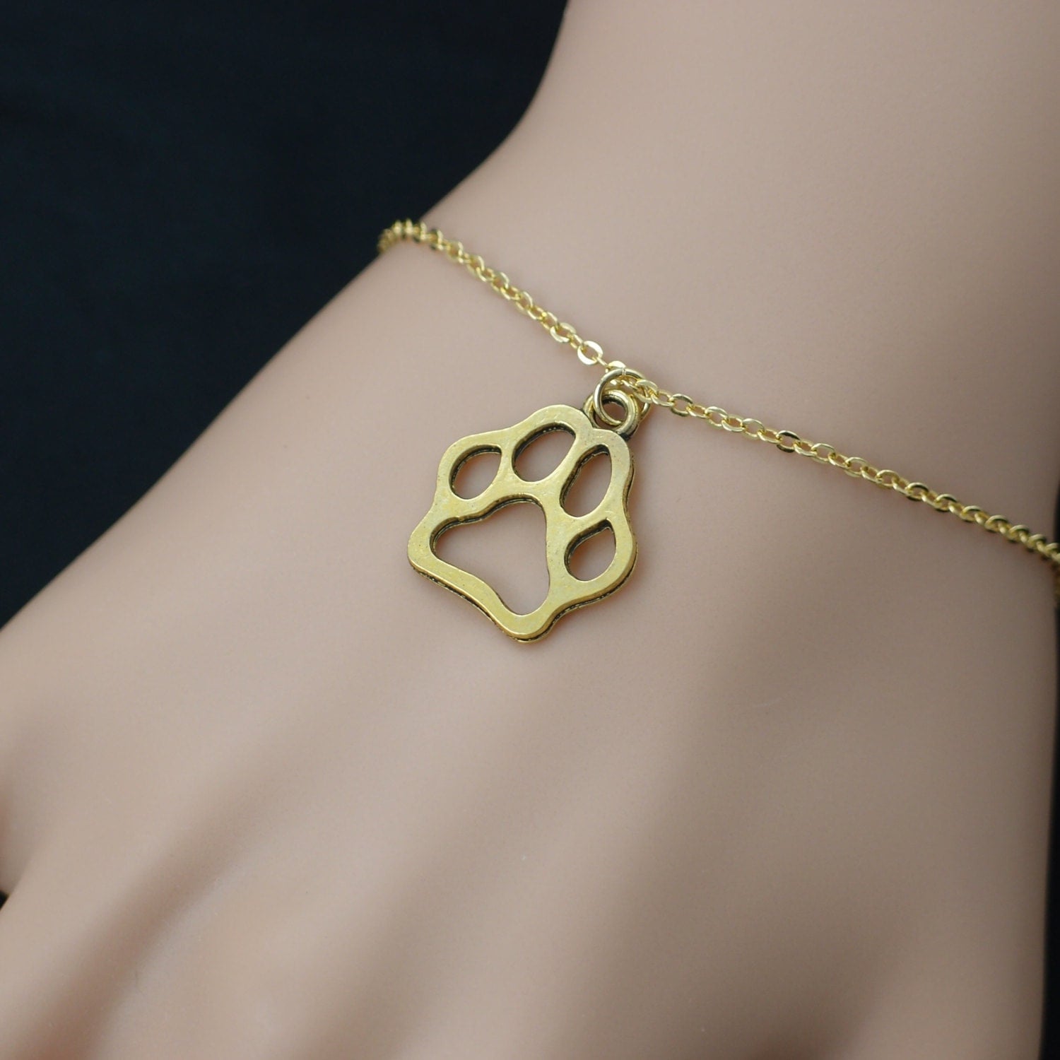 dog paw bracelet gold paw charm on gold plated chain pet