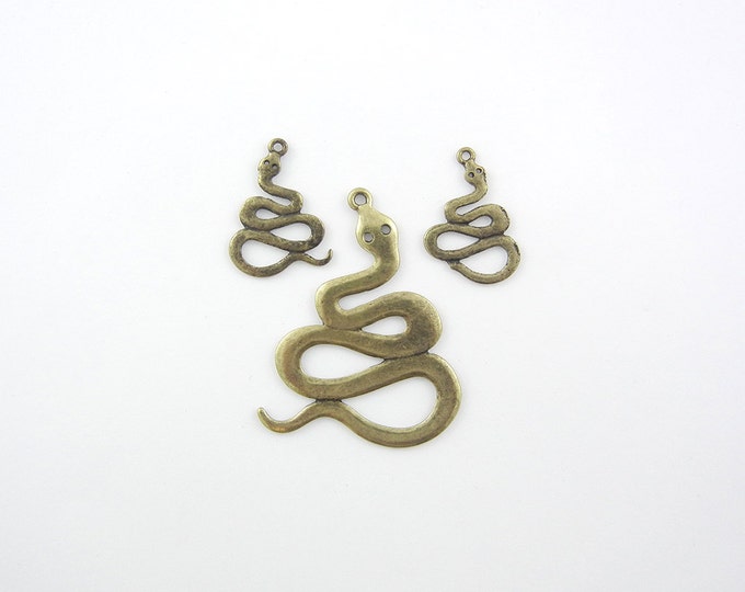 Set of Curled Snake Burnished Gold-tone Pendant and Charms