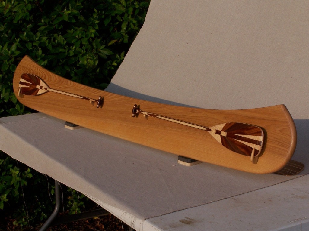 wooden canoe paddle display holder displays two 1/2 scale