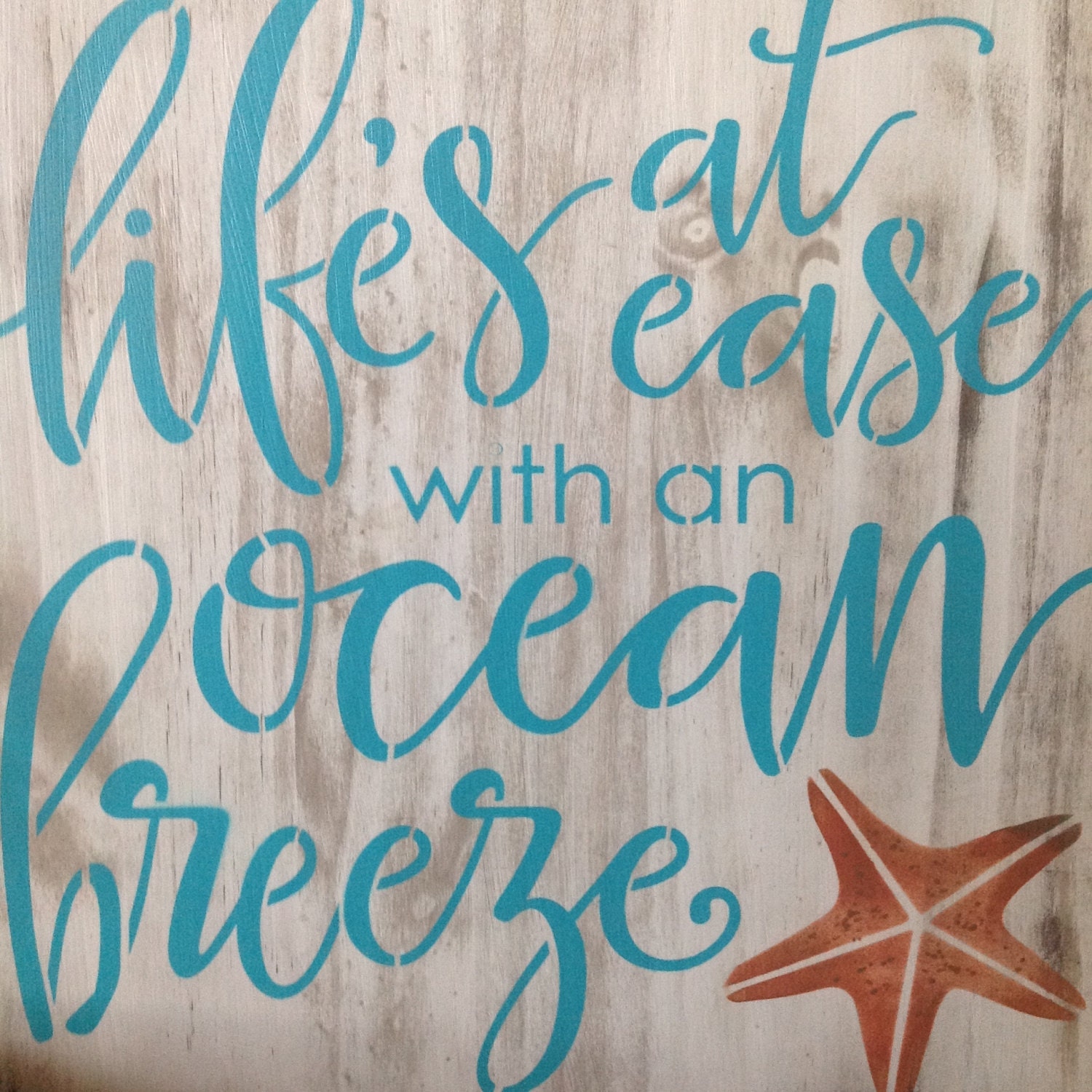 Life's at ease with an Ocean Breeze wood vintage sign