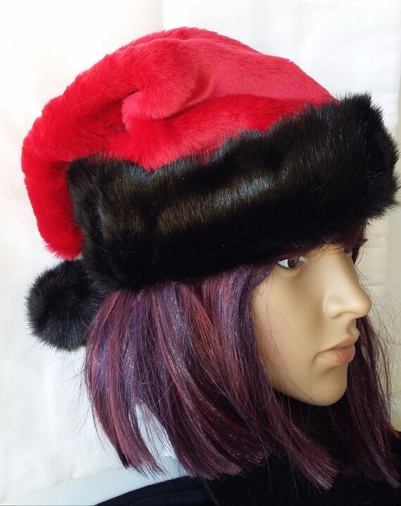red santa hat with short and shaggy black trim options red santa hat with short and shaggy black trim options