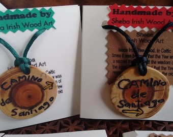 Camino de Santiago Wooden Pendant. Handcarved from Irish Yew Wood. Beautiful momento and conversation piece.