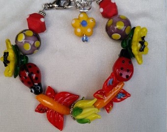 Lamp work glass bracelet/Butterflies/Flowers/Ladybugs/Red,orange, yellow, blue, purple/Summer bracelet/OOAK/BOHO/Nature/Flower/Floral