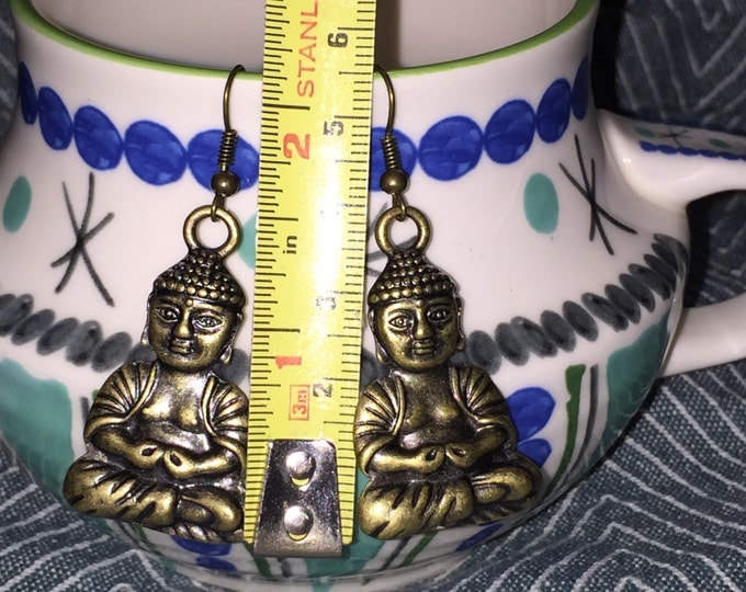 Large buddha earrings