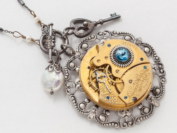 Steampunk Necklace Vintage Elgin gold pocket watch movement on silver filigree with blue crystal & pearl, skeleton key pendant jewelry by steampunknation steampunk buy now online