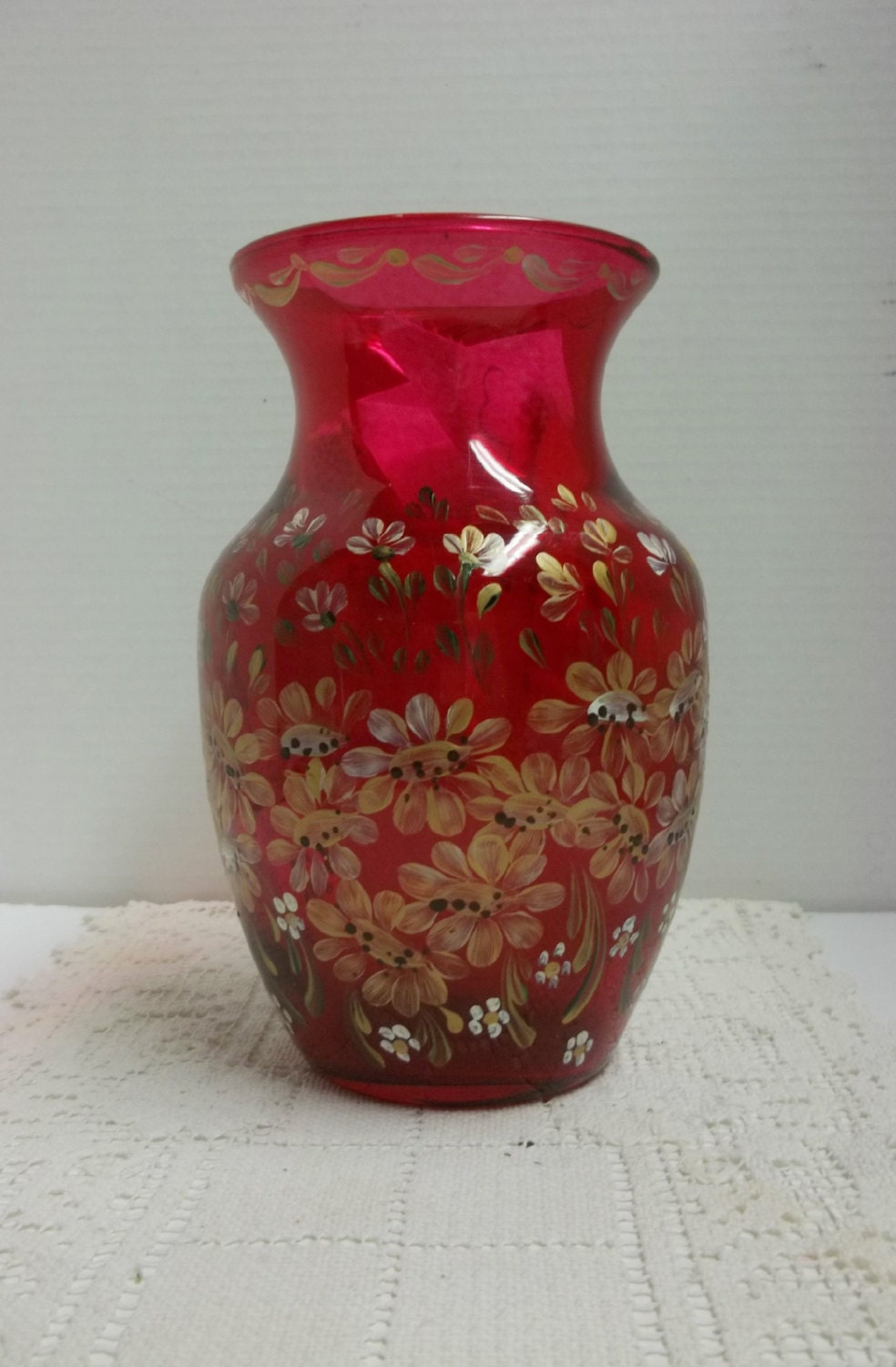 small red glass vase with white overlay
