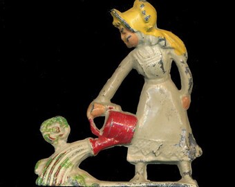 1930s (M159) Manoil Happy Farm Girl Watering Flowers
