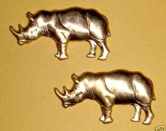 4 pcs. vintage raw brass rhinoceros animal figural stampings #f584
