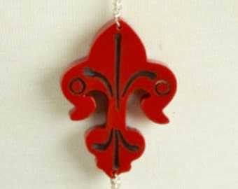 Bakelite Pendant flur de lis pendant , sold by each