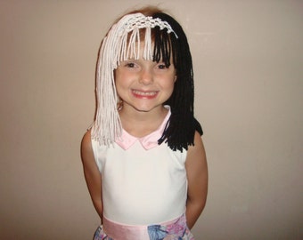 Cruella Deville or Sia inspired wig headband, great for costumes and dress up!