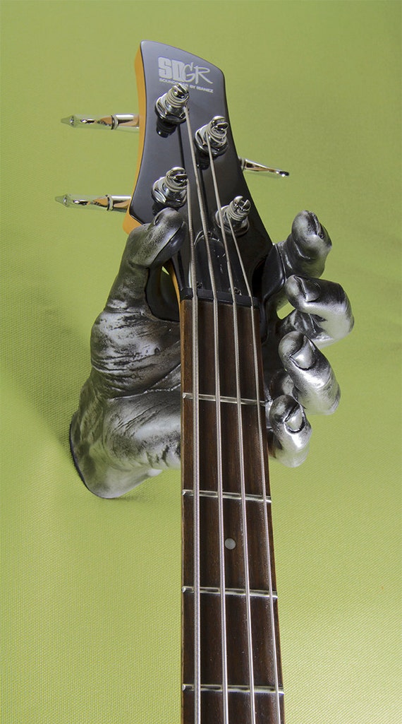 Antique Finish Pewter hand guitar hanger. Unique guitar