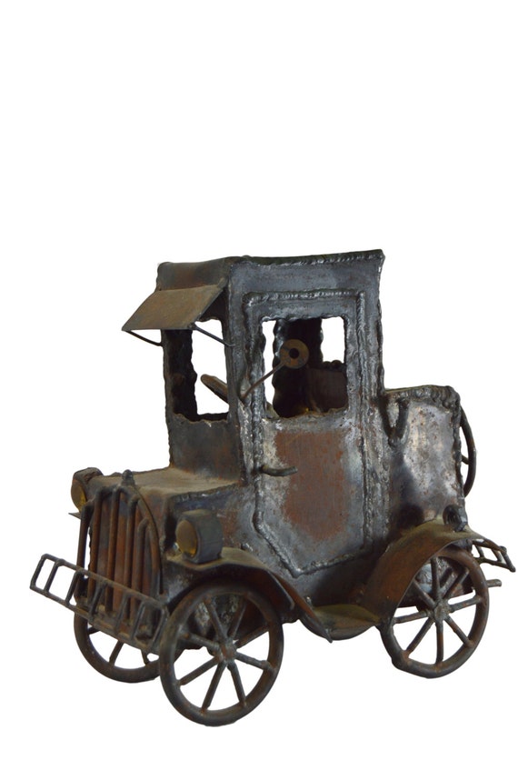 Vintage Welded Rusty Metal Car Sculpture: Man by GenerationUpcycle