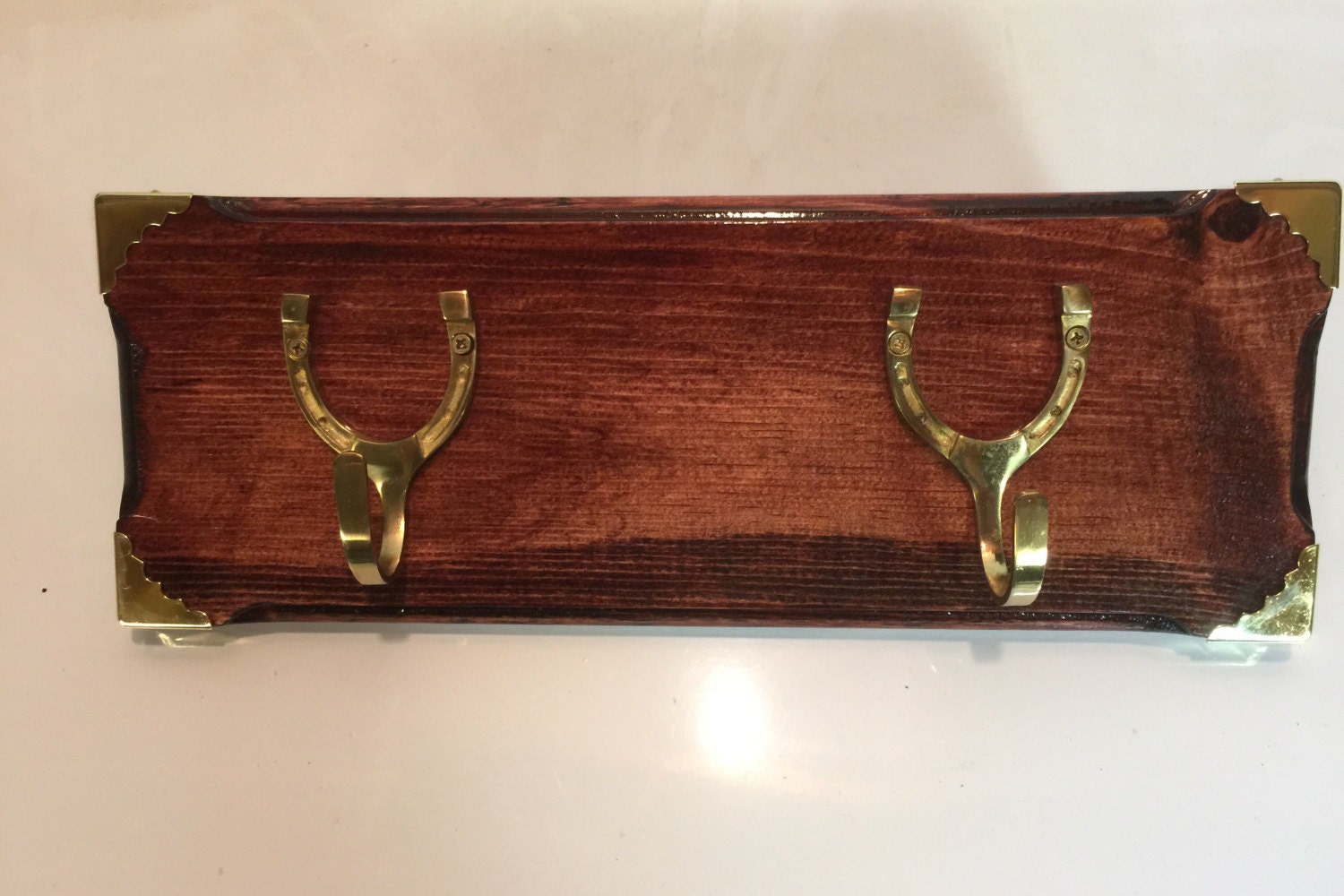 Horseshoe Bridle Rack w/ brass hooks holds two bridles