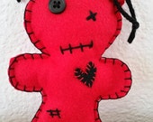 red voodoo dolls