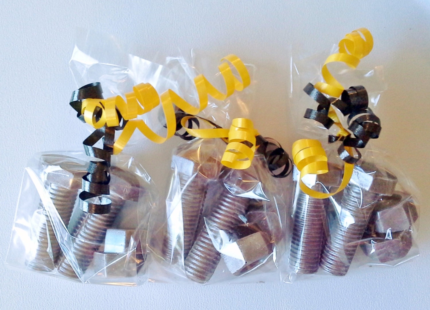 Chocolate 3 D Nuts and Bolts favors or cupcake toppers