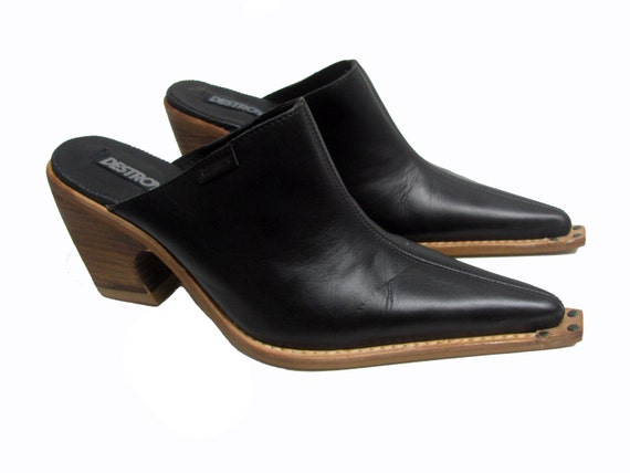 black leather pointed toe mules