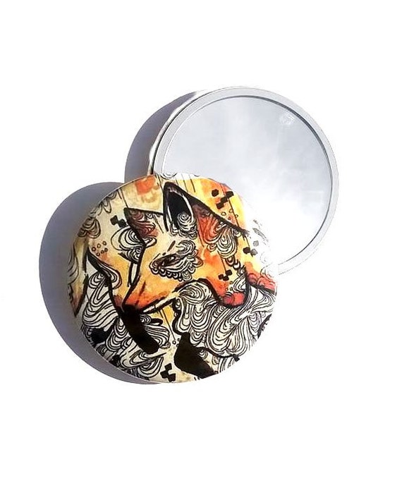 Small compact mirror