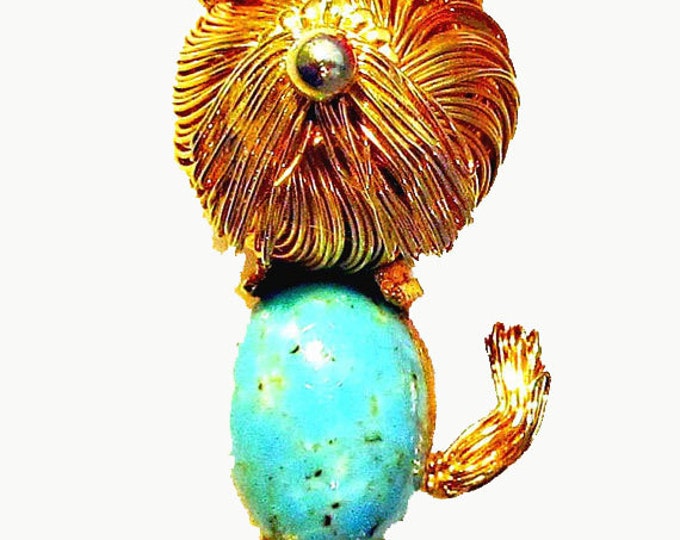 Dog brooch of gold wire wrapped and blue speckled cabochon figurine pin