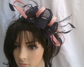 Stunning Sinamay and Feather Fascinator Rosette Leaves,and crystal stamens