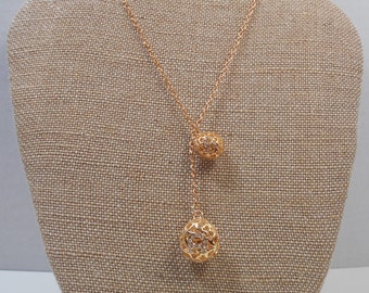 Items similar to Gold-plated Filigree Ball Necklace on Etsy