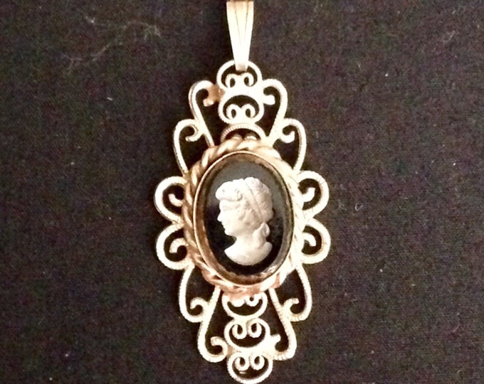 Storewide 25% Off SALE Vintage Gold Tone Adora Signed Designer Cameo Pendant Featuring Unique Black Portrait And Detailed Lattice Trim