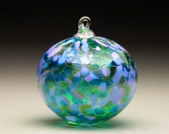 hand made blown glass Christmas ornament in tones of lavender, purple, and green, Lavender