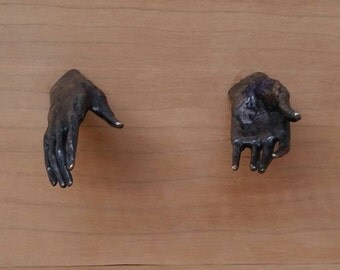 Cabinet and drawer pulls 2" long small bronze hands with 1" screw
