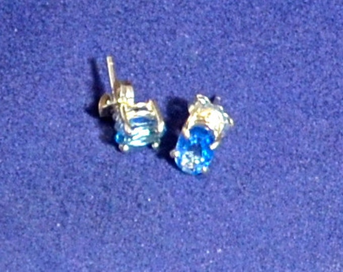 Swiss Blue Topaz Studs, 7x5mm Oval, Natural, Set in Sterling SilverE617