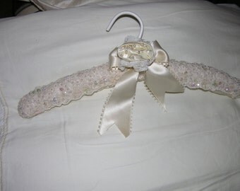 exquisite hand made hangers of the finest laces in the world bridal/special occasion