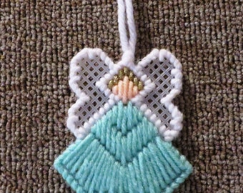 Small needlepoint angel.