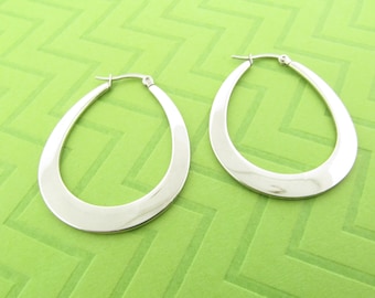 large stainless steel hoop earrings. 1 3/4 inches long