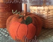 Wool applique pumpkin using motif by "Under the Garden Moon"
