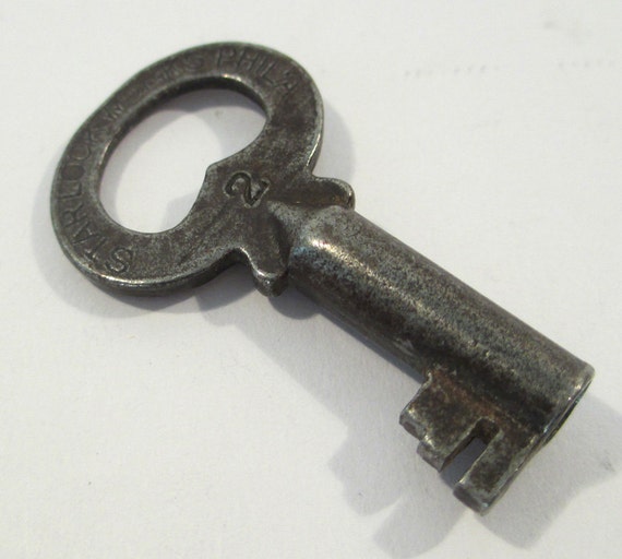 Antique small secretary key marked Star Lock Works