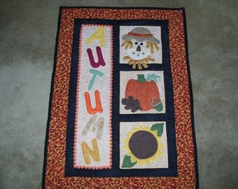 Fall quilt that has been machine quilted and appliqued-scarecrow quilt-pumpkin quilt-autumn quilt