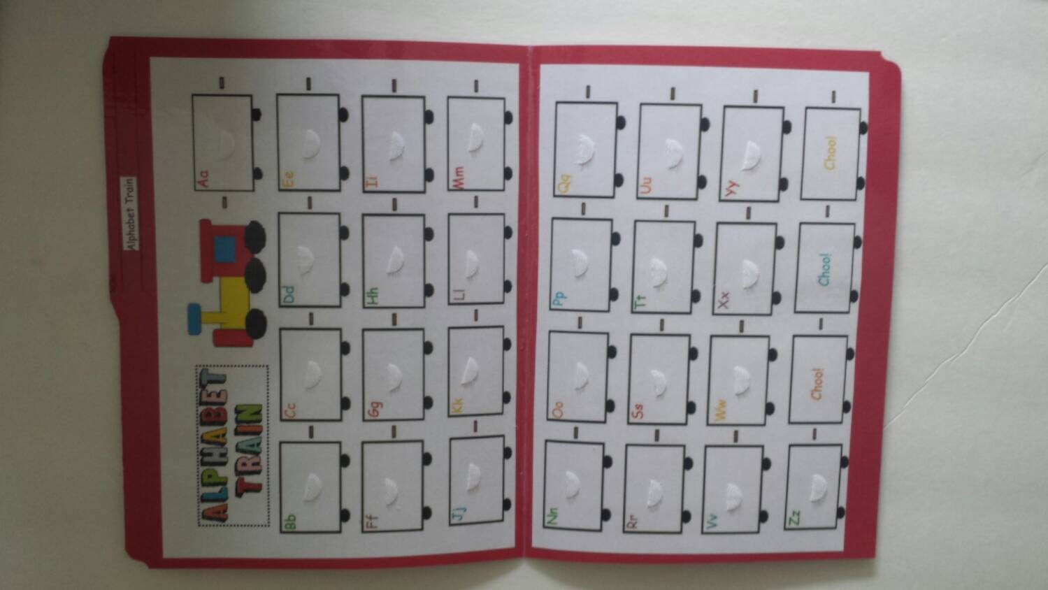 File Folder Game Alphabet Matching Activity by GardenOfLearning