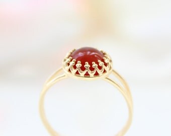 Carnelian ring | Delicate gold ring set with a carnelian gemstone