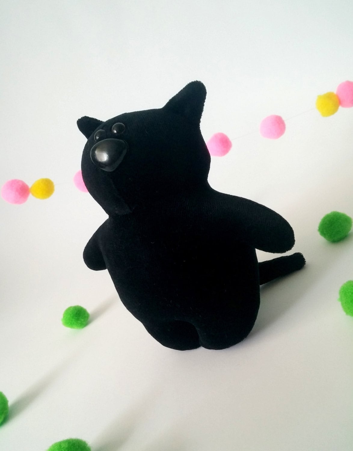 black and white soft toy cat