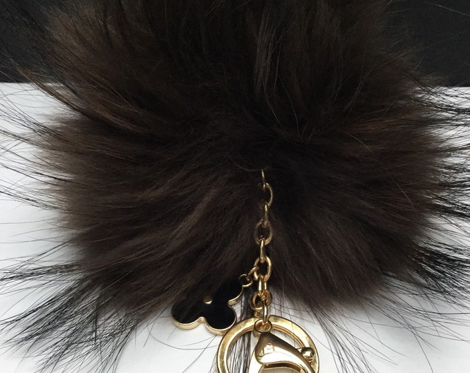 Deep brown with natural markings Raccoon Fur Pom Pom luxury bag pendant + black flower clover charm keychain