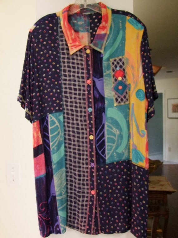Vintage color block style shirt with floral buttons and shoulder pads ala 1980s