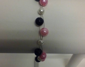 Beaded soft wire bracelet.