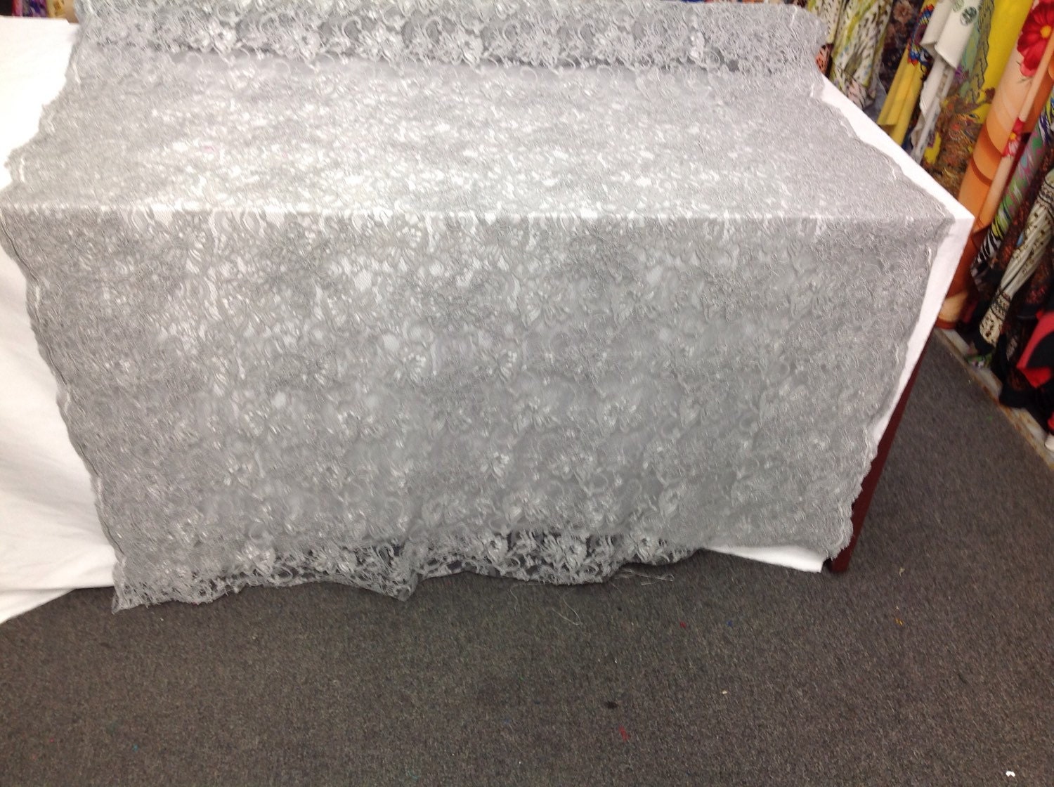 French design flower mesh fabric silver. Sold by the yard.