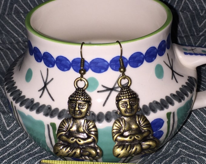 Large buddha earrings