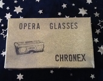 Chronex opera glasses in original box.