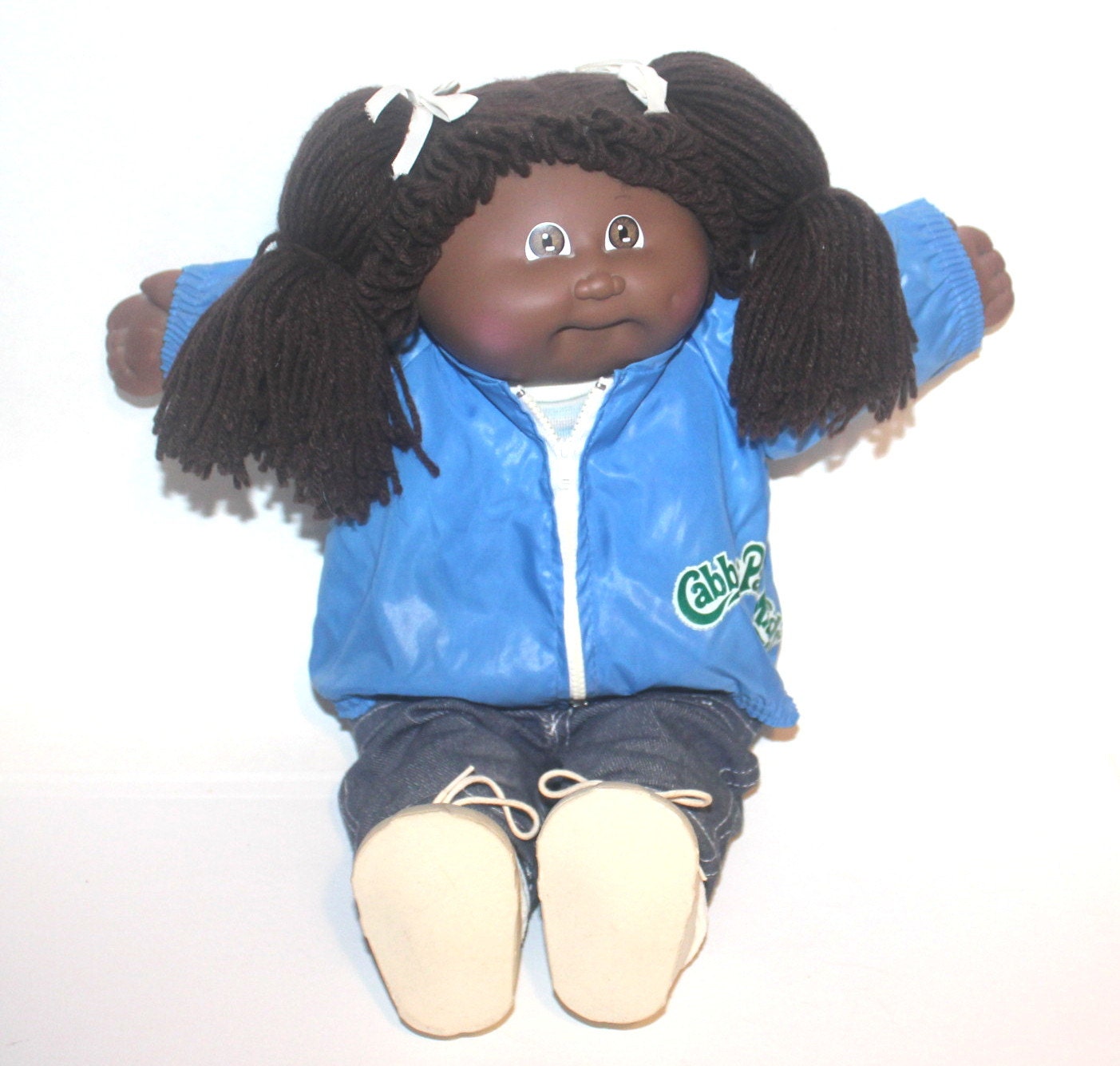 cabbage patch doll with lollipop